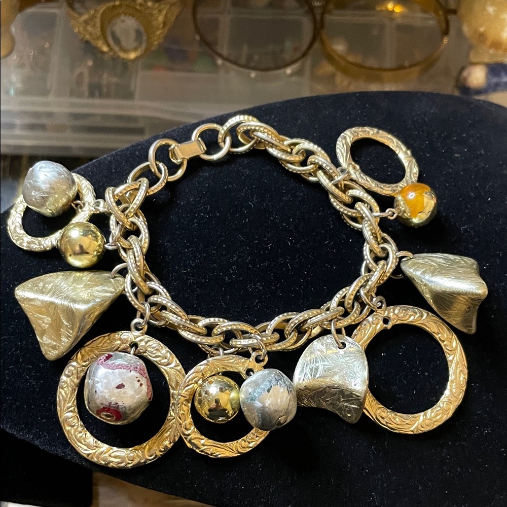 Gold and Gold Tone Charm Bracelet